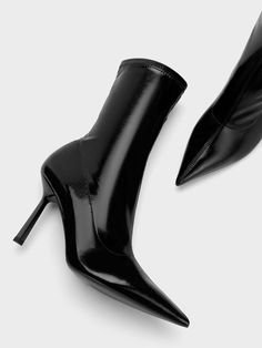 Featuring an artfully crinkled patent finish for a visually striking effect, this iteration of our stiletto heel ankle boots are a must-have for the fashion mavericks in our midst. In classic black for maximum style versatility, these boots feature a sleek pointed-toed silhouette that will add a sophisticated feel to any outfit you choose. Set on towering 9cm stiletto heels that will instantly elevate your stature, these boots are a fashion force to be reckoned with. Shoes Boots Ankle, Heel Ankle Boots, Charles Keith, Patent Leather Heels, Heeled Ankle Boots, Black Ankle Boots, Belt Size, Stiletto Heel, Leather Heels