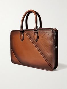 Investing in a smart briefcase, such as this one from Berluti, for important meetings and conferences will help to ensure you make the right impression. It's been made in Italy from the label's signature Venezia leather that will age well over time and unzips to reveal a spacious interior with organisational pockets. Carry it by the top handles or attach the shoulder strap to wear it over your shoulder. Berluti Bag, Business Briefcase, Leather Briefcase Men, Briefcase For Men, Aging Well, Leather Briefcase, Global Style, Personal Shopper, Bagpack