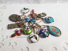 Hello, this is an unusual handmade charm religious style bracelet that I found at an estate sale. Length 8.5 inches. 12 Charms: 8 Cloisonne Charms - 5 round ones - 3 crosses - 4 metal types -  2 charms have Ruega Pot Nosotros Italy stamped on the backs. See photo #7  Charm Size: approx. 1/2 to 1.0 inch lengths.  Metal Link bracelet - handmade, teardrop shape, wire soldered.  Working clasp.  Pre-owned, good vintage condition. Please ask any questions you might have. ✦ My items are Smoke and Perfume Free ... Shop / Home / Office Thank you for visiting my store.💚 Click here... ✦ www.etsy.com/shop/SylCameoJewelsStore www.etsy.com/market/sylcameojewelsstore Victorian Bracelets With Vintage Charm As Gift, Antique Handmade Charm Bracelet For Gift, Victorian Style Bracelet With Vintage Charm For Gift, Handmade Antique Charm Bracelet For Gift, Handmade Antique Charm Bracelet As Gift, Vintage Handmade Charm Bracelet Collectible, Handmade Vintage Charm Bracelet Collectible, Vintage Medallion Bracelet For Gift, Vintage Handmade Collectible Charm Bracelet