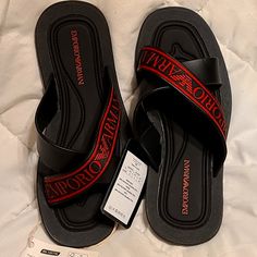 Original, Authenticated Emporio Armani Sandals. Brand New Designer Synthetic Sandals For Beach, Designer Black Leather Flip Flops, Black Leather Sole Slip-on Sandals, Black Leather Footbed Flip Flops, Black Leather Footbed Open Toe Flip Flops, Black Open Toe Flip Flops With Leather Footbed, Designer Cushioned Beach Sandals, Designer Leather Flip Flops For Summer, Designer Black Flip Flops For The Beach