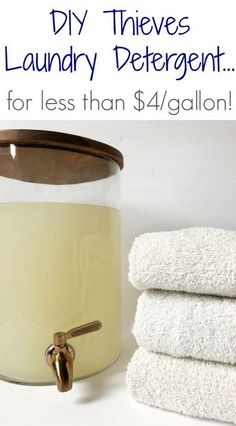 there is a glass container with towels in it and the words diy these laundry deterent for less than $ 4 / gallon