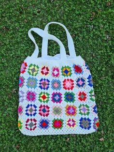 I crochet grandmother's knitted bags for you. This wonderful white crochet bag is the perfect accessory for your summer and winter outfit. Summer is so close and the sun is shining everywhere, it's time for summer fashion :) -This wonderful crochet bag is the perfect accessory for your summer winter outfit. -Soft and bright colors in adorable granny square shape. -Inner lined -The crochet bag has enough space for all your belongings :) -Entirely handmade crochet by me after my own design. -The c Afgan Crochet, White Crochet Bag, Boho Bag Crochet, Afghan Granny Square, Rainbow Cardigan, Granny Square Afghan, Retro Bags, Crochet Vintage, Hippie Bags