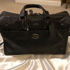 Beautiful Coach Purse, Black Leather With Black Chrome Rivets And Buckles. Zipper Close With Inner Pocket. Adjustable Strap. , Nwot. Dust Bag Included. Designer Travel Briefcase With Branded Hardware, Classic Black Briefcase With Branded Hardware, Black Leather Briefcase With Branded Hardware, Elegant Coach Briefcase For Travel, Elegant Black Briefcase With Zipper Closure, Designer Black Briefcase For Work, Designer Bags With Snap Closure For Formal Occasions, Black Rectangular Coach Briefcase, Vintage Shoulder Bag