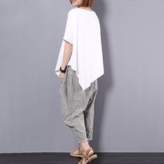 Plus Size - Women Irregular Loose 100% Cotton T-Shirt – BUYKUD Casual Asymmetrical T-shirt For Spring, Oversized Solid Color Tops With Asymmetrical Hem, Oversized Asymmetrical Cotton Tops, Oversized Cotton Tops With Asymmetrical Hem, Oversized Tops With Asymmetrical Hem In Solid Color, Oversized Cotton Top With Asymmetrical Hem, Lagenlook Solid Color Summer Tops, Lagenlook Solid Top With Asymmetrical Hem, Lagenlook Solid Color Top With Asymmetrical Hem