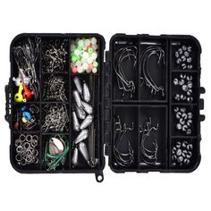 an open black case filled with lots of different types of beads and other things in it