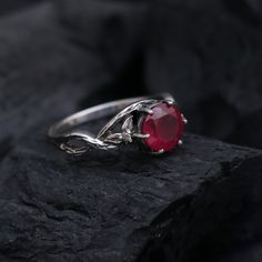 This Ring comes with a 100% Natural Ruby Gemstone and it is made up of 925 solid sterling silver. This ring is handcrafted by our skilled craftsmen and designed by us. Every gemstone is handpicked for the best quality.  Materials:- Silver (925 Solid Sterling Silver) Gemstone:- Natural Ruby  Item Weight :- Approx. 4 Grams Stone Size :- 8 MM Stone Shape :- Round Cut Select Size in Variation, if you don't find perfect size please buy any size and message us your size we'll make. Payment Policy :- Rings Red Stone, Twisted Band Ring, July Birthstone Ring, Nature Inspired Rings, Vintage Silver Rings, Twisted Band, Round Rings, July Birthstone, Silver Rings Handmade