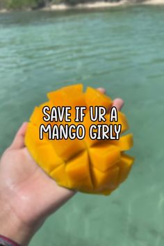 someone holding up a piece of fruit in their hand with the words save if ur a mango guy