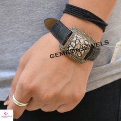 Rose Cut Polki Diamond Bracelet, Leather Belt Bracelet, Pave Diamond Jewelry, Unisex Jewelry, 925 Silver Bracelet Jewelry, 9.5 Inch Bracelet Gross Weight: 24.62 gram Polki Diamond Weight: 2.26 cts Pave Diamond Weight: 1.61 cts Bracelet Size: 9.5 Inch (33X27MM) NOTE:- All The Products Are Designed And Manufactured In My Workshop By Me & My Team. Shown Products Are Purely Handmade. Custom Orders Are Open Handly Accepted. We Are the Perfect Choice For Any Custom Jewelry Manufacturing. For Bulk Adjustable Bangle Bracelet With Box Clasp, Adjustable Bangle Bracelets With Box Clasp, Formal Adjustable Bracelets With Wrist Strap, Formal Adjustable Bracelet With Wrist Strap, Vintage Jewelry With Wrist Strap As Gift, Vintage Jewelry Bracelet As A Gift, Elegant Silver Rectangular Leather Bracelet, Silver Bracelet With Wrist Strap As Gift, Wrist Strap Bracelet Jewelry Gift