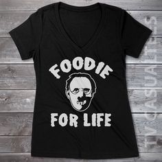 He has a unique taste in food. We prefer to print this design on Next Level's LADIES Ideal T line which is 60% combed ringspun cotton/40% polyester (Super soft 😍, not cheap and scratchy  but if those are not available from our supplier for the size and color you'd like we will use a comparable brand as a replacement to get you your item as soon as possible with the same quality and feel you've come to expect from Next Level.  The design is printed and shipped in the USA.  Wash garment inside out in COLD water on a delicate cycle. Dry with a no heat setting or hang dry. If you are unsure of what size to get please note that this is a LADIES FIT which is smaller than a regular womens fit, so please buy a size up or check the sizing chart in the photos to make sure we send you the correct si Horror Funny, Stroudsburg Pa, Pop Culture Shirts, Novelty Clothing, No Heat, Sizing Chart, For Life, Womens Clothing Tops, Pop Culture