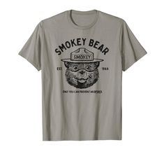 PRICES MAY VARY. Distressed style. Vintage Smokey Bear Logo Only You Can Prevent Wildfires Smokey Bear has been spreading his message of wildfire prevention since 1944. Celebrate this American outdoor icon with this new line of products designed with his mission in mind! Officially Licensed. The name & character of Smokey Bear are the property of the United States, as provided by 16 U.S.C. 580p-1 and used under license from the Forest Service, U.S. Department of Agriculture. 2022 USDA Forest Ser Bear Logo, Steps Design, Forest Service, Vintage Pins, Cool Tees, Buy Vintage, Branded T Shirts, Retro Fashion, Top Styles