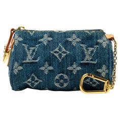 Sublime​ ​Clutch/Keychain​ ​or​ ​bag​ ​charm​ ​Speedy​ ​PM​ ​collection​ ​Spring​ ​Summer​ ​2005​ ​designed​ ​by​ ​Marc​ ​Jacobs​ ​in​ ​denim​ ​with​ ​monogram​ ​print,​ ​brown​ ​leather​ ​and​ ​gold​ ​metal​ ​trim Denim​ ​Monogram​ ​canvas Interior​ ​in​ ​beige​ ​microfiber Golden​ ​metal​ ​trim Main​ ​compartment Keychain​ ​clip Internal​ ​stamp:​ ​«Louis​ ​Vuitton​ ​Paris:​ ​Made​ ​in​ ​France» Dimensions:​ ​12x8x6​ ​cm​ ​(4,7x3,4x2,3​ ​Inches) Reference:​ ​101859 General​ ​condition:​ ​9/10 Louis Vuitton Paris, Keychain Clip, Hermes Jewelry, Jewelry Roll, Keychain Bag, Monogram Prints, Metal Trim, Louis Vuitton Speedy, Small Accessories