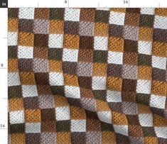 a brown and white checkerboard pattern is shown