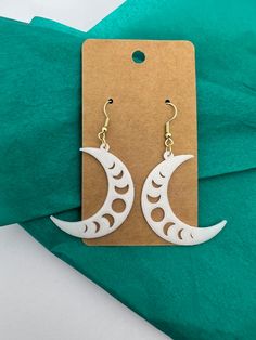 3D printed crescent moon earrings with silver plated backings.  Stylish and Sustainable: Biodegradable Earrings Because these are 3D Printed they can display layer lines, which is part of the printing process. If you have questions, please feel free to contact me! White Handmade Moon-shaped Earrings, White Moon-shaped Earrings As Gift, Moon-shaped White Earrings For Gift, White Round Moon Phase Earrings, White Moon-shaped Earrings For Gifts, White Moon-shaped Earrings For Pierced Ears, White Crescent Earrings As Gift, White Crescent Earrings For Gift, White Crescent Earrings For A Gift