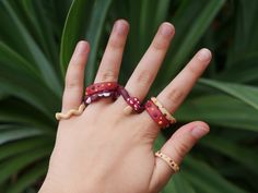 One of a kind, stackable polymer clay rings  *If you would like any of these rings in another size please send me a message through Etsy and I'd be very happy to make a custom sized ring for you! Dimensions: 1. Colourful spots / 16mm 2. Beige spots / 16mm 3. Squiggly eyes / 19mm 4. Mushroom / 18mm 5. Colourful spots / 18mm *This item is sent without tracking  How to care for your rings: - Do not wear your rings while swimming and showering - Clean rings with a damp cloth or soft fabric - Store r Handmade Adjustable Clay Jewelry, Unique Hand Painted Adjustable Rings, Playful Handmade Polymer Clay Jewelry, Unique Handmade Adjustable Stackable Rings, Handmade Adjustable Rings For Friendship, Cute Adjustable Hand Painted Jewelry, Cute Adjustable Hand-painted Jewelry, Polymer Clay Rings, Fimo Ring