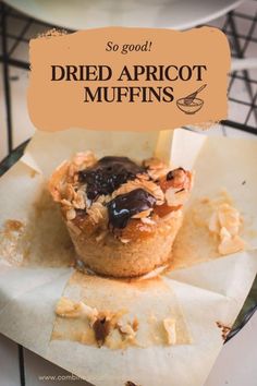 a close up of a muffin on a plate with the words so good dried apricot muffins