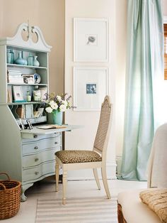 a chair and desk in a small room