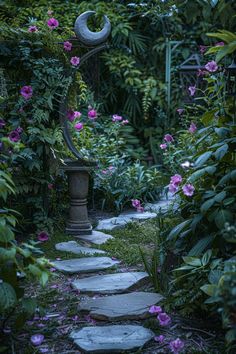 a stone path in the middle of a garden with pink flowers growing on both sides