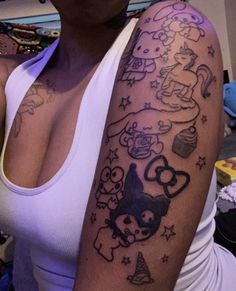 a woman with a tattoo on her arm