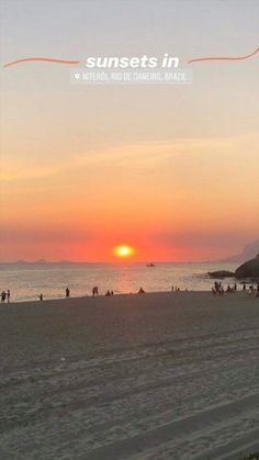 the sun is setting at the beach with people on it