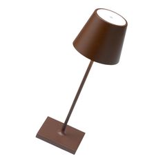 a brown table lamp with a white light on the base and a dark colored shade