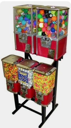 two red bins filled with different types of candy