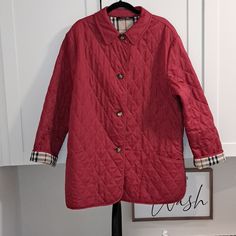 Very Good Used Condition Burberry Red Diamond Quilted Jacket Incorporates A Boxy Silhouette. The Design Is Lined In Our Signature Iconic Check Print. Jacket Is Engineered With Thermo Regulation Technology To Accelerate Evaporation And Breathability, So You Never Feel Too Hot Or Cold. Made In England Designer: Burberry Brand: Burberry Callouts Are: Sizing Tzag Was Cut Out. There Are A Few Loose Threads On The Back Bottom Of The Coat And Inside One Sleeve. (See Pictures) On Both Left And Right Sle Burberry Jacket, Red Diamond, Diamond Quilt, Print Jacket, Quilted Jacket, Left And Right, Burberry, Cut Out, England