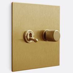 an image of a golden light switch on the wall