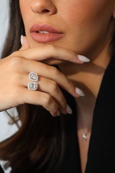 a close up of a person wearing a ring