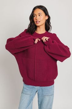 Our Ribbed Knitted Sweater is the ideal wardrobe piece for the winter season. Its banded cuffs and balloon sleeves provide fashion-forward flair, while its ribbed knit texture provides a slimming silhouette to flatter any figure. Sweater has an intentionally oversized, relaxed fit. Model is wearing a small. Recommended sizing 0-2 XS, 4-6 S, 6-8 M, 10-12 Trendy Balloons, Feminine Blouses, Knit Texture, Sweater Fits, Judy Blue Jeans, Ribbed Knit Sweater, Women Clothing Boutique, Balloon Sleeves, Sweater Sleeves