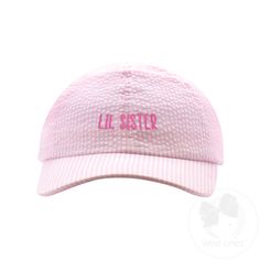 Get your little one ready to be the cutest "LIL SISTER" around with this pink seersucker ball cap! The "wee stitch" embroidery adds a playful touch to this accessory. Perfect for any outing, this cap will have your baby girl looking adorable while keeping her head protected. Cotton/poly blend. Toddler Girl Accessories, Nursery Nurse, Neutral Accessories, Pink Seersucker, Lil Sister, Toddler Hat, Bow Accessories, Blush And Gold, Stitch Embroidery