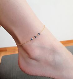 This beautiful handmade anklet features 3 Genuine Blue Sapphire gemstones wrapped in the metal of your choice. Dainty, minimal, and elegant, this bracelet is the perfect finishing touch to any style or event. Makes a great gift to add to any gemstone lover's collection. Perfect to gift for Christmas, Valentine's Day, Mother's Day, and more! Gemstone: Sapphire Gemstone Size: 3.0 mm Gemstone Shape: Rondelle, Faceted Metal: 14k Gold Filled or Sterling Silver (Nickel Free) Anklet Length: 9 inches (m Elegant Blue Anklets For Gifts, Elegant Blue Anklets For Gift, Handmade Sapphire Minimalist Jewelry, Handmade Minimalist Sapphire Jewelry, Elegant Handmade Anklet Bracelet, Elegant Handmade Sterling Silver Anklets, Handmade Elegant Anklets, Blue Dainty Anklets For Gift, Minimalist Handmade Anklet As Gift