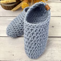 "Keep your toes toasty warm with these warm cozy knit handmade slippers. Crocheted from a thick soft yarn, they are sure to be the coziest slippers your feet have ever been in.  Slippers are gender neutral and are a perfect gift for yourself or someone in your life who needs some extra cozy comfort. They are great for wearing at home or for packing in your bag to bring along when visiting friends or family.  These cozy indoor slipper socks are super stretchy and won't cause constriction of your feet but will keep their shape as well.    ITEM DETAILS:   * Handmade with a soft bulky acrylic yarn which is a great option to wool slipper * Available in 20 colours  * Option of 4 different size  * Handcrafted in a hygienic enviorment at my cozy farm in small town Saskatchewan  * Fully washable fo Cozy Handmade Winter Slippers, Cozy Crochet Slippers For Winter, Casual Crochet Slippers For Winter, Handmade Cozy Yarn Slippers, Casual Crochet Winter Slippers, Crochet Round Toe Slippers For Winter, Winter Crochet Slippers With Round Toe, Handmade Yarn Slippers For Winter, Casual Winter Yarn Slippers