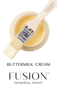 a close up of a paint brush with the words, buttermilk cream