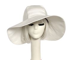 Embrace the sun in style with our luxurious White Cotton Sun Hat. Crafted from soft, cozy cotton twill, this oversized brim hat is perfect for any sunny getaway. Its packable design maintains its shape while the bendable brim offers versatile styling options. Handmade in the USA for a truly exclusive touch. 5" brim 1" band One size fits most up to a 23" Made in the USA Machine wash cold / hand dry Packable press if needed Solid Color One Size Sun Hat For Beach, One-size Beach Sun Hat, One Size Vacation Sun Hat, Sun Hat For Beach, Chic Adjustable Wide Brim Bucket Hat, One Size Curved Brim Sun Hat For Spring, One Size Sun Hat With Curved Brim For Spring, Chic Solid Color Sun Hat With Flat Brim, Chic Curved Brim Sun Hat