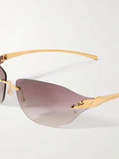 Cartier Eyewear's rimless sunglasses are accented with the iconic 'Panthère' motif along the temples. They're made from polished gold-tone metal and fitted with gradient lenses that recall classic '00s styles. Luxury Rimless Sunglasses With Mirrored Lenses, Luxury Rimless Polarized Sunglasses, Luxury Rimless Sunglasses With Tinted Lenses, 00s Style, Tom Ford Bag, New Bottega, Rimless Sunglasses, Eyewear Womens, Sunglasses For Men