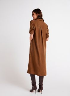 Elevate your wardrobe with our Duster Dress featuring a western yoke design and side slits for a modern twist on a classic silhouette. This dress comes with long sleeves that can be rolled up for versatility, making it perfect for any occasion. Pair it with your favorite boots for a chic look, or dress it down with sandals for a more casual vibe. 100% TENCEL™Lyocell Yoke Design, Duster Dress, Cold Front, Bella Dahl, Favorite Boots, Classic Silhouette, Twist, Long Sleeves, Maxi Dress