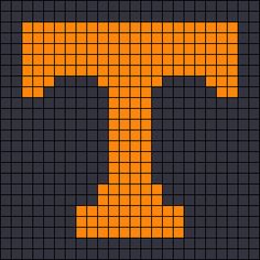 the letter t is made up of orange and black squares, which are arranged in rows