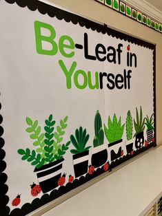 a bulletin board that says be - leaf in yourself on the side of a wall