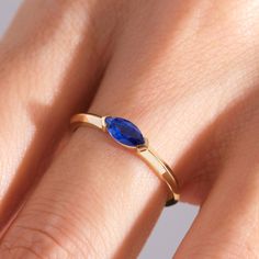 Here is Marquise Sapphire Ring for Women! This Stackable Birthstone Ring will be perfect matches as a other blue person gift 18K. With 10K 14K 18K Gold Customize Blue Gemstone Ring is best balance of minimalism.  This Horizontal Set Everyday Ring will be great marquise sapphire ring or marquise birthstone ring in her daily life as well! This dainty sapphire ring can be switch with her birthstone or birth month stone as well and can be 14K sapphire ring.  This Sturdy and Stunning lovely gemstone ring or September birthstone ring lover symbolizing your everlasting love & serves as a perfect gift for Daughter, women, wife, girlfriend or best friend! Please check our other birthstone gold rings: https://www.etsy.com/shop/Cristojuanna?ref=seller-platform-mcnav§ion_id=43057914 Ring Features: Ban 14k Gold Marquise Birthstone Ring Gift, 14k Gold Marquise Cut Gemstone Birthstone Ring, 14k Gold Birthstone Ring With Marquise Cut Gemstone, Marquise Cut Birthstone Ring In 14k Gold, 14k Gold Marquise Cut Sapphire Ring As Gift, Blue Opal Birthstone Ring In 14k Gold, Marquise Sapphire Ring In Yellow Gold As Gift, Yellow Gold Marquise Sapphire Ring Gift, Marquise Sapphire Ring In 14k Gold