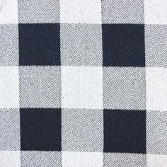 black and white checkered fabric textured with some sort of woven material stock photo