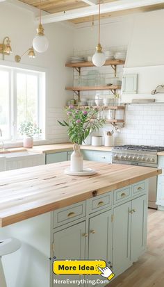 A bright and inviting kitchen design that features wooden countertops and white cabinetry. The large island provides ample workspace and seating, while open shelving adds a practical and decorative element. Pendant lights and natural light from the windows enhance the warm, welcoming atmosphere. Small Kitchen Renovation Ideas, Small Kitchen Renovation, Country Kitchen Ideas, Country Vibes, Cottage Style Kitchen, Green Kitchen Cabinets, French Country Kitchen, Kitchen Design Ideas, Cottage Kitchen