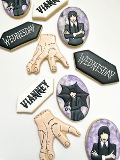 decorated cookies are arranged in the shape of hand and finger with words that read wednesday