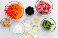 the ingredients for this dish include carrots, green beans and meat