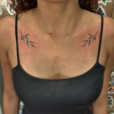 a woman with a tattoo on her chest