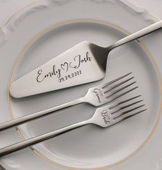 two forks and one knife on a plate with the names of each fork engraved onto it