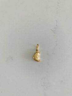 14K Solid Gold Moon Pendant | Yellow Gold Moon Pendant | Moon Pendant | 14K Solid Gold Pendant |⁙ Materials: 14K Yellow Gold⁙ Dimensions: 9MM Height by 7MM Width, the opening of the ring (jump ring) is 3MM wideProduction Times:⁙ Order processing time varies between 1-3 business days⁙ All orders placed on Saturday, Sunday, or on a national holiday will begin processing the following business day 14k Gold Filled Yellow Gold Moon Jewelry, 14k Gold Moon Shaped Tarnish Resistant Jewelry, Celestial Style 14k Gold Half Moon Jewelry, 14k White Gold Moon Phase Jewelry, 14k White Gold Moon Shaped Jewelry, White Gold 14k Moon Shaped Jewelry, 14k Gold Celestial Jewelry Featuring Moon Phases, 14k Yellow Gold Moon Shaped Jewelry, Tarnish Resistant 14k Gold Moon Jewelry