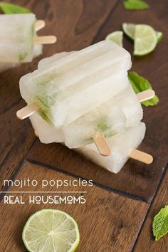 popsicles made with real limes and mojita chips on a wooden table