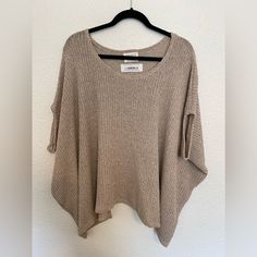 Nwt Poncho Style Sweater In Oatmeal Color - Soft, Flowy And Oversized Lightweight Flowy Sweater, Casual Soft Knit Fall Poncho, Sweater Poncho Outfit, Cozy Soft Knit Poncho For Layering, Oversized Casual Beige Poncho, Poncho Sweater With Sleeves, Oversized Cozy Shawl Poncho, One-size Beige Knit Poncho, Poncho Outfit