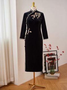 This gorgeous 2024 Fall Traditional Chinese Qipao dress is inspired by the classic cheongsams of Old Shanghai. Made from soft black velvet, it features beautiful embroidery that adds a touch of elegance. Perfect for special occasions or cultural celebrations, this modern chipao blends timeless style with a fresh twist. You'll love how it brings a bit of tradition to your wardrobe! Size Chart: S: Shoulder width-36cm, Chest-83cm, Waist-66cm, Hip-87cm M: Shoulder width-37cm, Chest-87cm, Waist-70cm, Elegant Embroidered Cheongsam With Stand Collar, Traditional Fitted Dress With Stand Collar, Traditional Formal Dress With Stand Collar, Formal Embroidered Fitted Cheongsam, Fitted Floral Embroidered Cheongsam For Party, Fitted Floral Embroidery Cheongsam For Party, Elegant Floral Embroidered Dress With Stand Collar, Elegant Long Sleeve Cheongsam With Floral Embroidery, Fitted Ao Dai With Stand Collar For Banquets