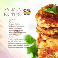 some crab cakes are stacked on top of each other